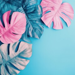 Colorful tropical leaves on a blue background for design purposes.