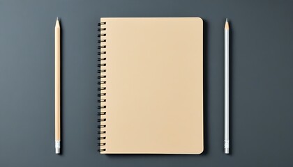Elegant stationery setup featuring a creative notebook and neutral-colored pencil.