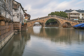 Fototapeta premium The ancient architectural complex and canal scenery of Qiandeng Ancient Town in Suzhou, Jiangsu Province, China
