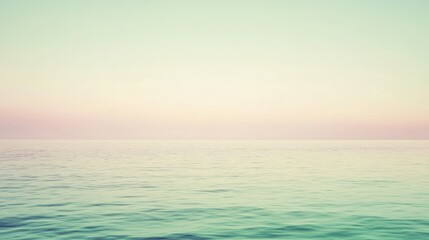 Obraz premium Serene Pastel Sky Meets Calm Ocean Water