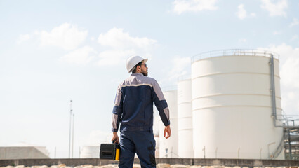 Mechanical engineer working and holding toolbox to checking and inspection gas pipeline.