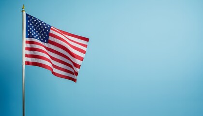 American Flag Waving Proudly Against a Clear Blue Sky Patriotism, Freedom, and National Identity