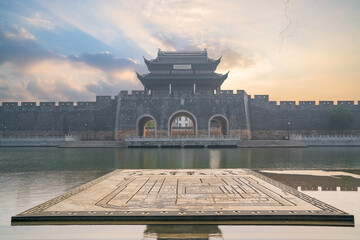 Beautiful scenery of the ancient city wall ruins and moat and bridge in Suzhou, Jiangsu Province,...