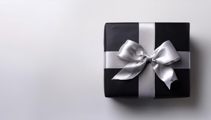 Black Gift Box with Silver Ribbon on White Background. Top View of Father Day Gifts with Copy Space