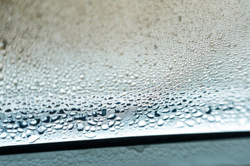 Moisture on cold glass window surface