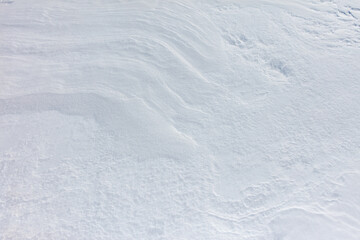 A snow covered ground with a white line in the middle