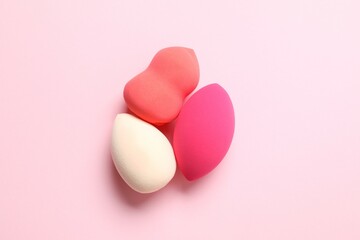Beauty blender on a color background. Bright sponges for make-up cosmetics. Make-up products....