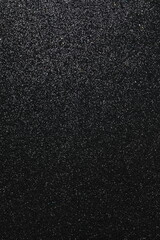 Shiny black glitter texture background
