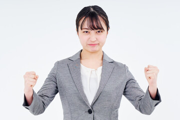 ストレスを抱えるスーツ姿の女性