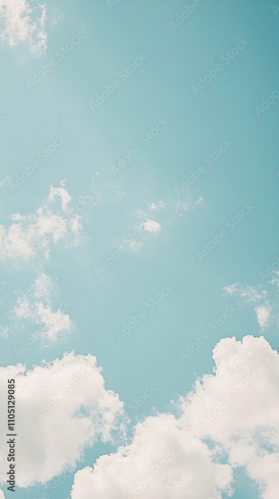 Poster ethereal cloudscape soft wispy clouds floating across a serene pastel blue sky creating a sense of c