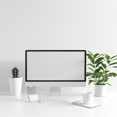 Modern personal computer with blank white screen, keyboard, mobile phone and office accessories on desk at workplace of graphic designer, blogger. Electronic devices, technology and creativit
