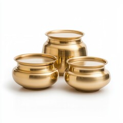 Three elegant brass pots with smooth surfaces and varying sizes, showcasing a polished finish that reflects light beautifully. isolated on white background