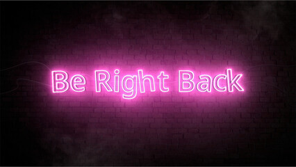 Pink Neon Sign Saying 'Be Right Back' on Dark Brick Wall Background