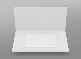 White plastic gift card in folded paper package. Minimal setup for showcasing loyalty, banking, membership or discount cards. Empty template for branding. Elegant mockup of certificate in holder.