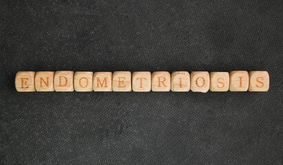 letters of the alphabet with the word ENDOMETRIOSIS. The cause of endometriosis is unknown