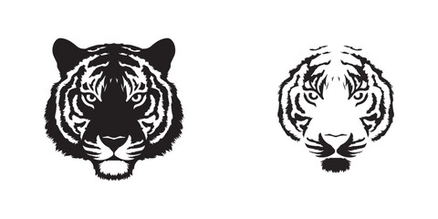 A silhouette of a tiger head On white background. A tiger face staring at you dangerously tattoo.