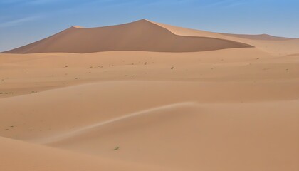 Desert Beauty with Endless Sand under Blue Sky