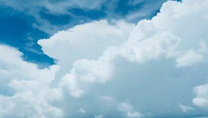 Naklejka premium Magical white clouds floating, showcasing the beauty of the vast sky.
