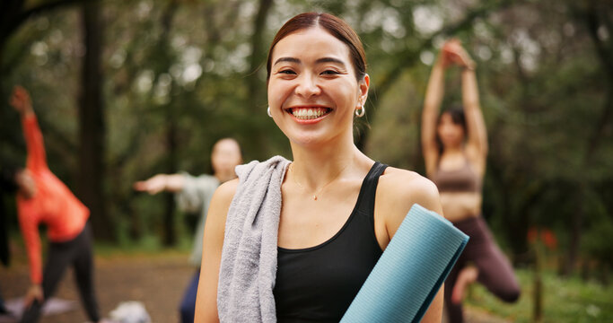 Park, woman and happy on portrait for yoga session with mat for health, self care and wellbeing in Japan. Female person, outdoor and smile or satisfied in confidence for fitness, workout and exercise