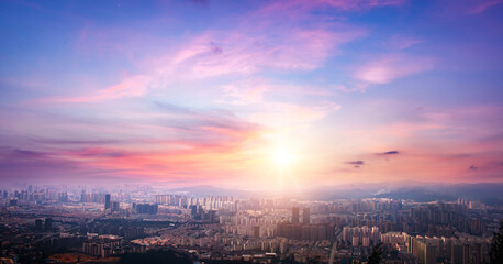 Beautiful panoramic aerial view of  city at sunset 