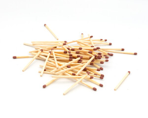Scattered Wooden Matches with Red Tips