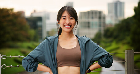 City, fitness and portrait of Japanese woman outdoor for cardio or marathon training routine....
