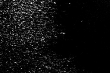Natural white snow on a black background