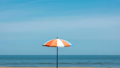 Colorful umbrella under the sky with serene coastal view