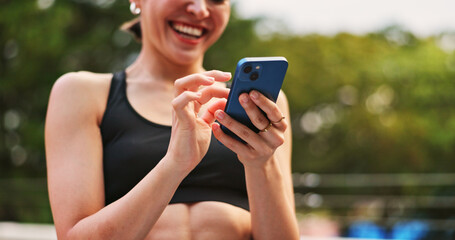 Outdoor, woman and happy for fitness with smartphone on app for tracking health progress in Japan. Female person, hands and laugh on internet or online with memes on social media and text message