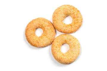Three round cookies with a hole on a white background. Sweet biscuits top view.