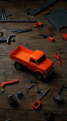 Fototapeta premium Orange Toy Truck Surrounded by Disassembled Parts on Rustic Wooden Tabletop