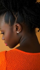 Contemplative Profile Woman Honors National Day for Truth and Reconciliation in Orange