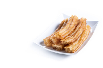 Spanish Churros. Traditional spanish food isolated on white background. Copy space