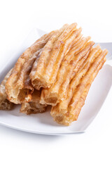 Spanish Churros. Traditional spanish food isolated on white background