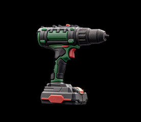 mini toy cordless drill machine on black background