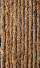 Shaggy fleecy jute rope surface. Linen rope texture. Rough natural eco-friendly background design with copy space