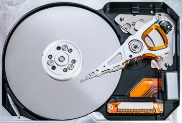 Disassembled hard drive from the computer, hdd with mirror effect