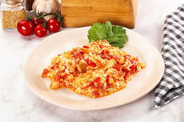 Shakshuka with tomato for breakfast