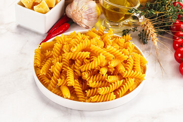 Italian dry pasta Fussili for bowl