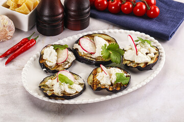 Grilled eggplant with cheese and radish