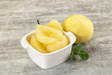Canned yellow pear with syrup