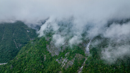 Misty mountain landscape reveals lush greenery in Hualien Taiwan during a cloudy day