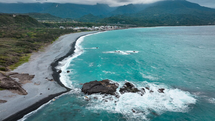 Beautiful shoreline view of Sanxiantai in Taiwan with dramatic waves and rocky formations