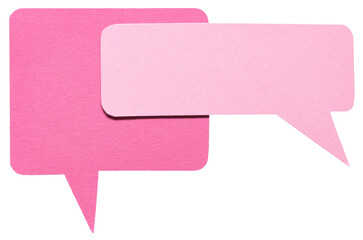 Pink blank cut out cardboard paper speech bubbles with rough edges and copy space for text on...