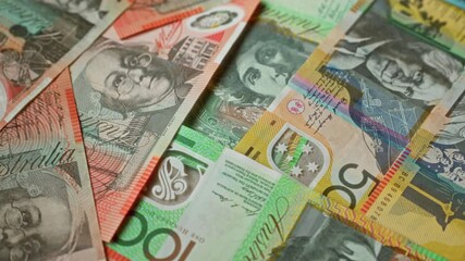 Australian banknotes display various colorful designs highlighting the nation's currency and financial symbols.
