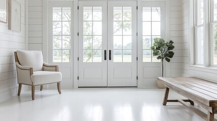 Fototapeta premium Spacious entryway with double doors, natural light, and whitewashed walls.