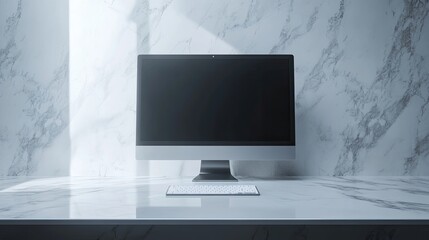 Fototapeta premium Sleek desktop computer setup against a marble backdrop. The dark screen contrasts beautifully with the bright, clean surface. Perfect for showcasing digital design or productivity.