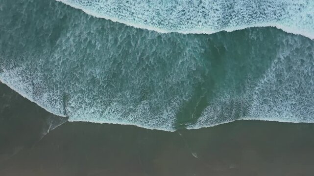 Playa de Caion: Turquoise Ocean Waves Rolling On Shore In A Coru&ntilde;a, Galicia, Spain. aerial, top-down shot