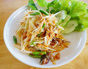 Spicy mackerel with papaya Salad, Thai spicy food