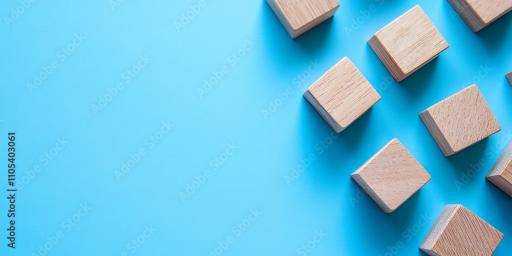 Leinwandbilder blank wooden block cubes on a blue background create a perfect canvas for your text. these blank woo